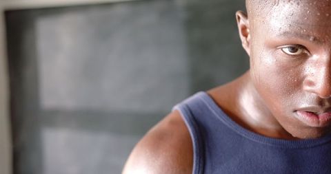 Determined athlete sweating during intense workout