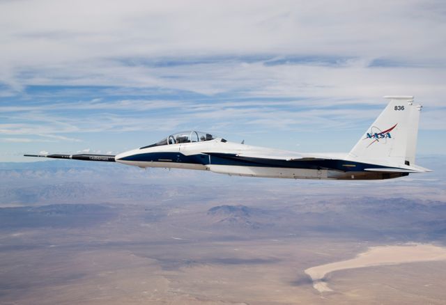 NASA F-15B #836 in flight with Quiet Spike attached. The project seeks to verify the structural integrity of the multi-segmented, articulating spike attachment designed to reduce and control a sonic boom.
