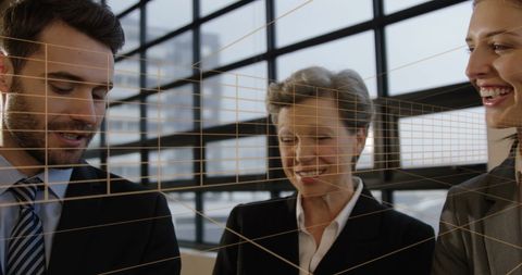 Business Professionals Collaborating with Digital Interface