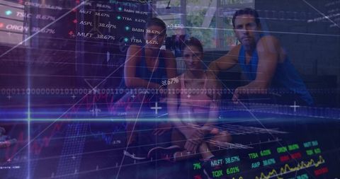 Fitness Trio Sitting on Mat with Double-Exposure Financial Charts and Gym Workout Gear