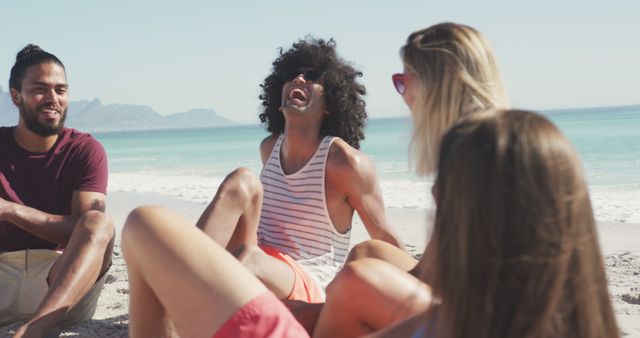 Friends Enjoying Fun Day on Beach Laughing and Relaxing - Download Free Stock Images Pikwizard.com