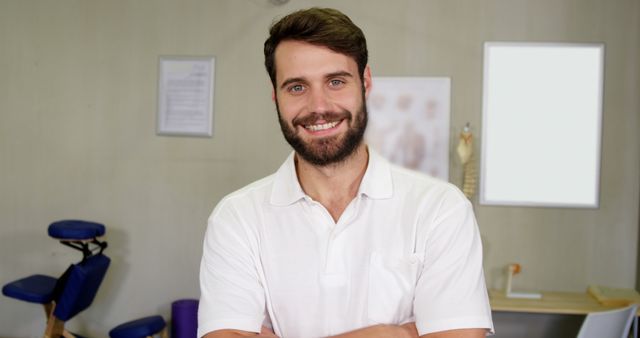 Friendly Physical Therapist Smiling in Clinic - Download Free Stock Images Pikwizard.com