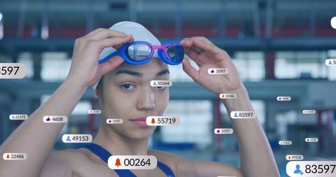Competitive swimmer adjusting goggles with social media notification overlays at pool