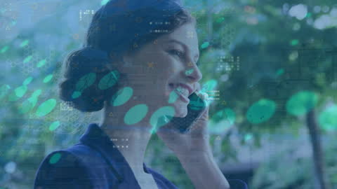 Businesswoman Communicating via Smartphone with Digital Data Overlay
