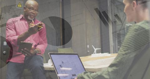 Diverse Professionals Analyzing Financial Data in Office Meeting