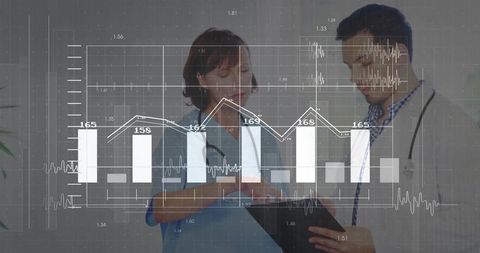 Nurse and doctor analyzing medical data on charts in clinic