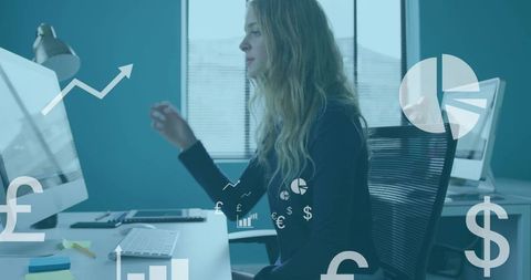 Blonde woman working at desk with finance analytics overlay and currency symbols