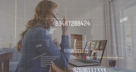 Focused Woman Engaging in Virtual Meeting for Remote Work