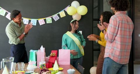 Colleagues Celebrating Baby Shower in Office Gathering