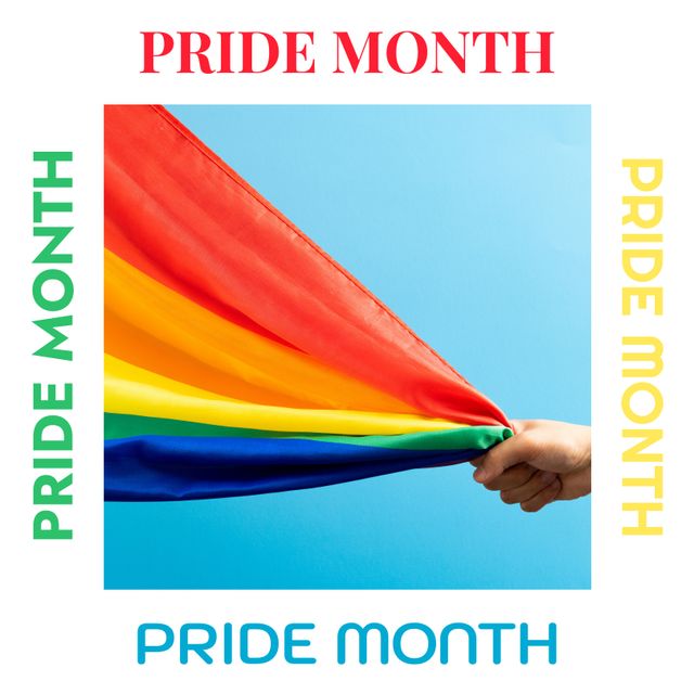 Hand Holding Rainbow Flag Celebrating Pride Month on Blue Background - Download Free Stock Templates Pikwizard.com