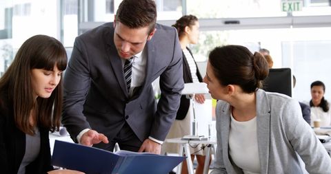 Professional Team Collaborating on Business Strategies - Download Free Stock Images Pikwizard.com