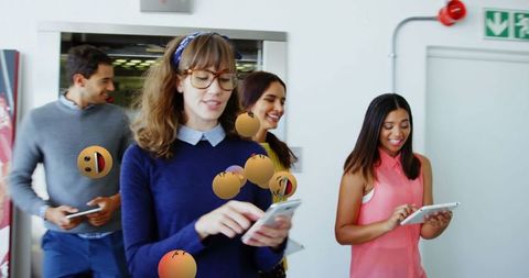 Young Professionals Using Smartphones in Office Hallway - Download Free Stock Images Pikwizard.com