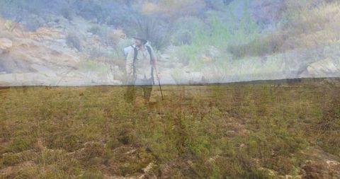 Hiker trekking semi-arid landscape for adventure and exploration