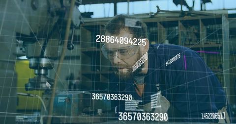 Technician Inspecting Bench Mill with Digital HUD Overlay in Industrial Workshop