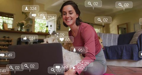 Woman Engaging on Social Media with Dog by Her Side at Home