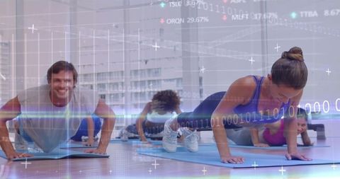 Group fitness class holding high plank with futuristic binary data overlay for wellness
