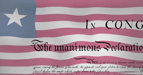 Unanimous Declaration blackletter calligraphy over draped historic flag with star canton