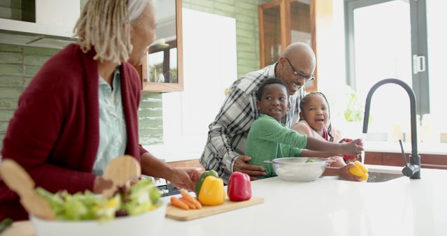 Family Cooking Together in Modern Kitchen with Fresh Vegetables - Download Free Stock Images Pikwizard.com