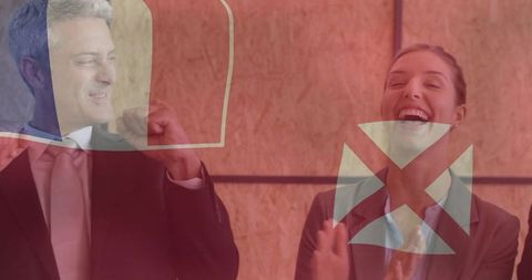 Business team celebrating success in modern office, applauding and cheering with red overlay