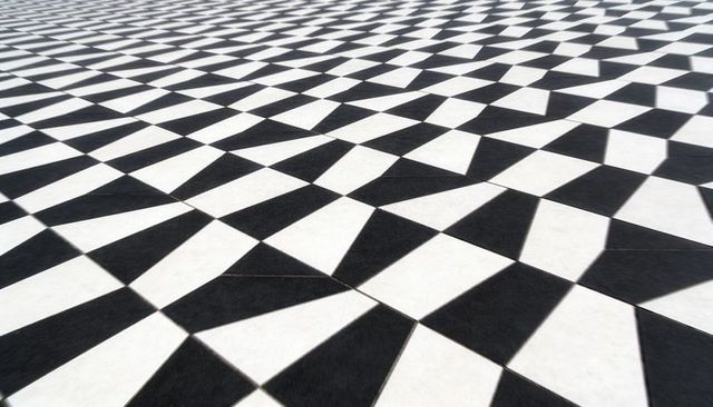 Monochrome Tessellated Tile Pattern Creating Optical Depth with Receding Diamond Geometry