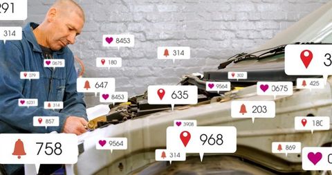 Mechanic Repairing Car Among Digital Alert Icons in Workshop