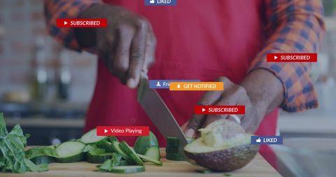 Cooking avocado while social media notifications appearing over kitchen countertop