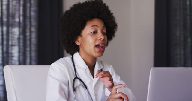 African-American Female Doctor Giving Online Consultation at Office - Download Free Stock Images Pikwizard.com