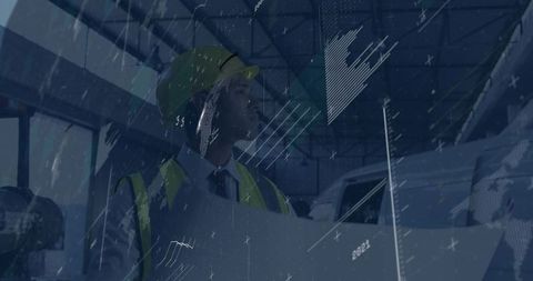 Engineer inspecting aircraft with blueprint in hangar