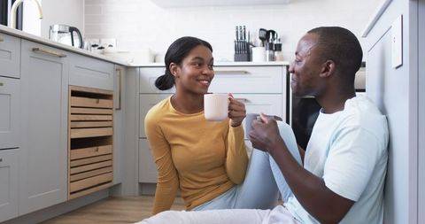 Young Couple Sharing Coffee Moment in Modern Kitchen - Download Free Stock Images Pikwizard.com
