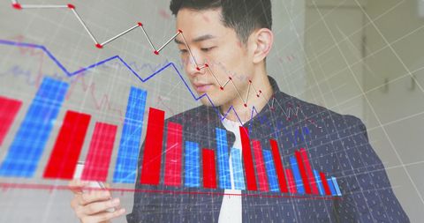 Business Professional Analyzing Financial Graphs on Smartphone