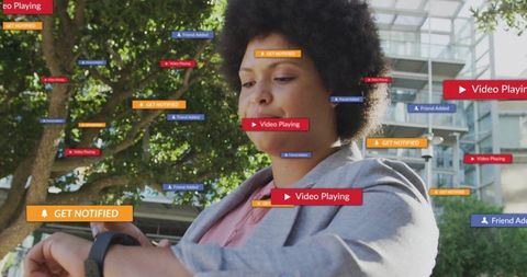 Young Professional Receiving Alerts Seamlessly in Urban Environment