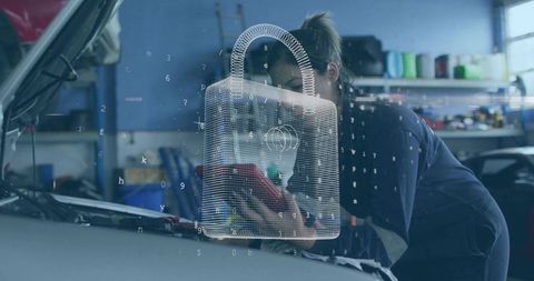 Female mechanic exploring cybersecurity integration in automotive engineering