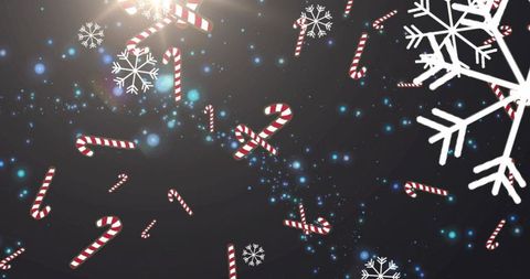 Falling candy canes and snowflakes with blue bokeh glow and lens flare