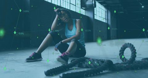 Exhausted athlete and digital performance analytics overlay