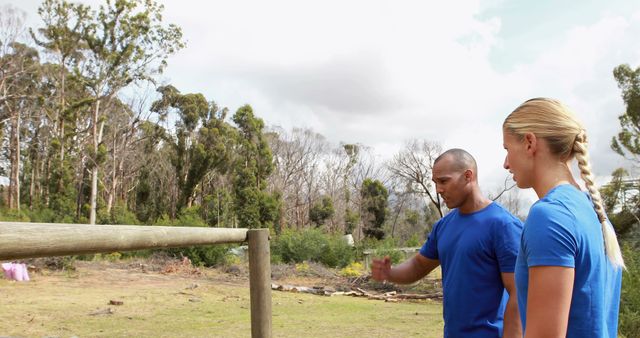 Athletic Man and Woman Training on Outdoor Obstacle Course - Download Free Stock Images Pikwizard.com