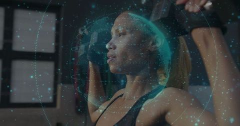 African American Woman Exercising in Gym with Digital Overlay