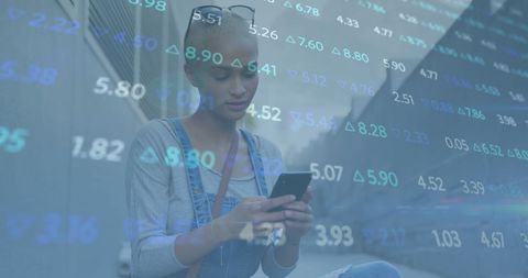 Woman Engaging with Technology Overlaid with Stock Market Data - Download Free Stock Images Pikwizard.com