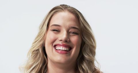 Happy Plus-Size Caucasian Woman Smiling with Glossy Lips
