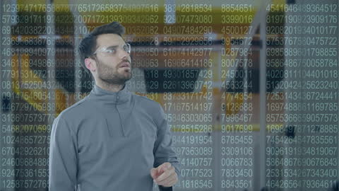 Technologist Analyzing Digital Data in Server Environment