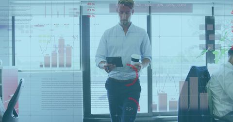 Businessman Analyzing Data on Digital Interface in Modern Office