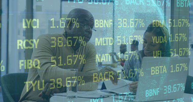 Financial Analysts Discussing Market Numbers in Modern Office - Download Free Stock Images Pikwizard.com