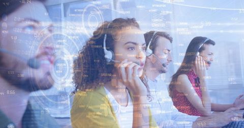 Customer support team analyzing data with digital interfaces