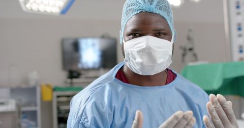 Focused Surgeon Prepares for Complex Surgery in Modern Hospital