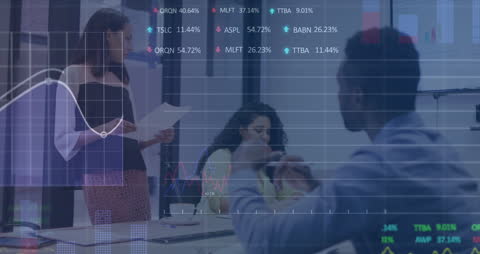 Diverse Business Meeting with Financial Data Projections
