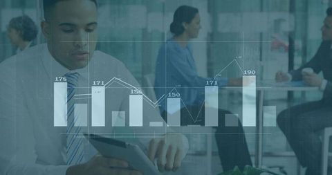 Business Professional Analyzing Data on Tablet with Charts Overlay