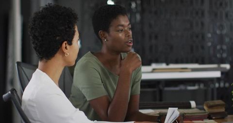 Collaborative Professionals Sharing Ideas in Modern Office