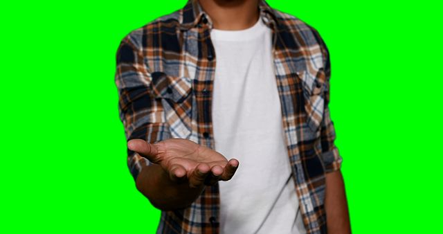 Man pretending to touch screen against green screen - Download Free Stock Photos Pikwizard.com