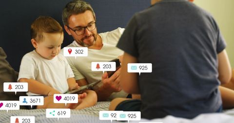 Family bonding with gadgets overlaid with social media notifications