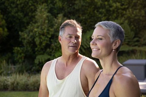 Senior Couple Enjoying Tranquil Backyard Garden Picnic