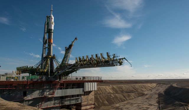 The Soyuz TMA-16M spacecraft is seen after having rolled out by train to the launch pad at the Baikonur Cosmodrome, Kazakhstan, Wednesday, March 25, 2015. NASA Astronaut Scott Kelly, and Russian Cosmonauts Mikhail Kornienko, and Gennady Padalka of the Russian Federal Space Agency (Roscosmos) are scheduled to launch to the International Space Station in the Soyuz TMA-16M spacecraft from the Baikonur Cosmodrome in Kazakhstan March 28, Kazakh time (March 27 Eastern time.) As the one-year crew, Kelly and Kornienko will return to Earth on Soyuz TMA-18M in March 2016.  Photo Credit (NASA/Bill Ingalls)